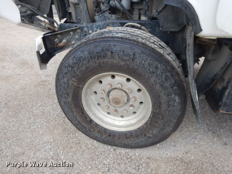 image for item HF9380 2004 Mack DM690S  roll-off container truck