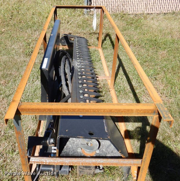 image for item JL9932 Wolverine  skid steer sickle mower