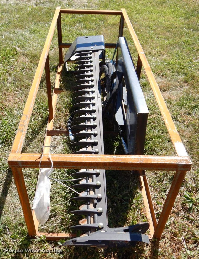 image for item JL9932 Wolverine  skid steer sickle mower