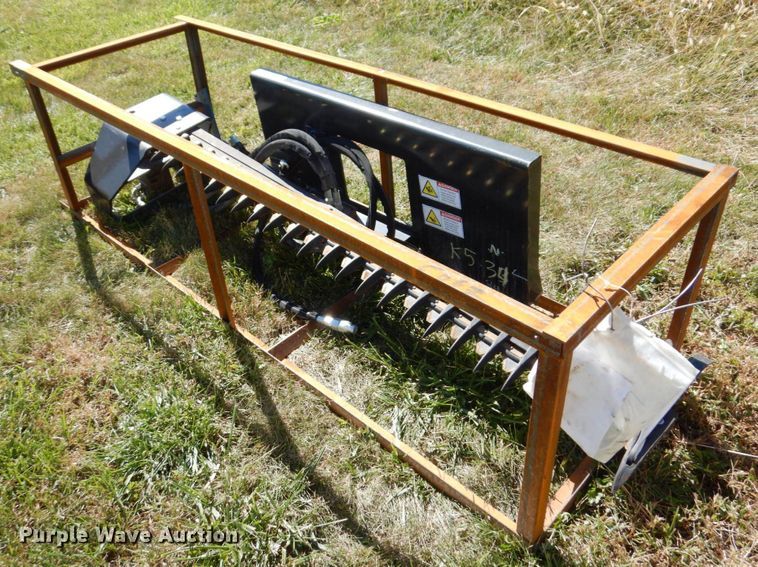 image for item JL9932 Wolverine  skid steer sickle mower