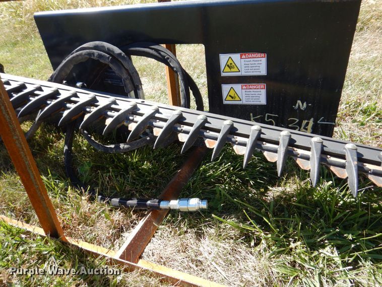 image for item JL9932 Wolverine  skid steer sickle mower