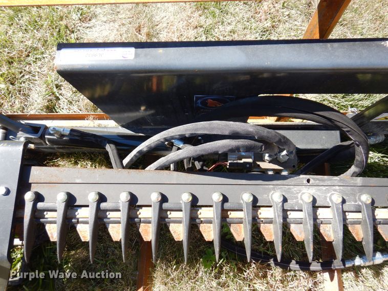 image for item JL9932 Wolverine  skid steer sickle mower