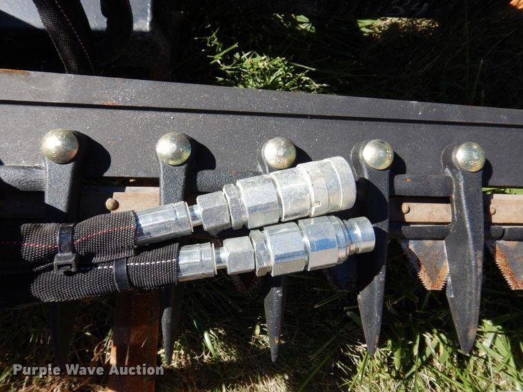 image for item JL9932 Wolverine  skid steer sickle mower