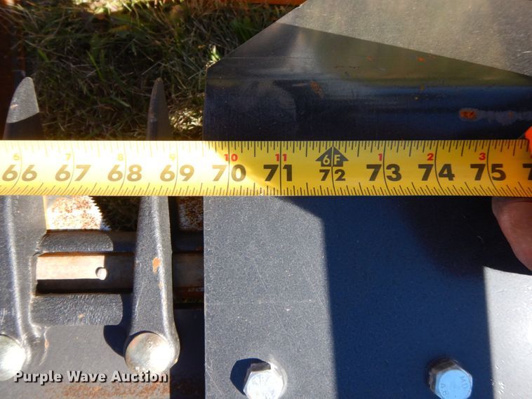 image for item JL9932 Wolverine  skid steer sickle mower