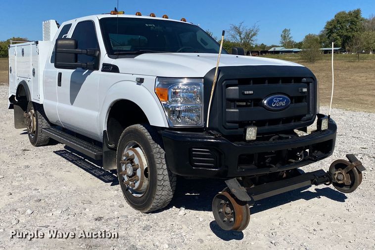 image for item JW9381 2011 Ford F350 Super Duty  SuperCab utility bed pickup truck