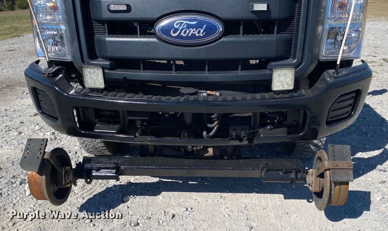 image for item JW9381 2011 Ford F350 Super Duty  SuperCab utility bed pickup truck