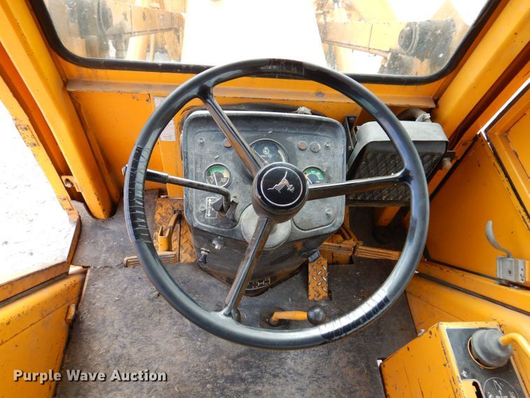 image for item KW9421 John Deere 310-A  backhoe