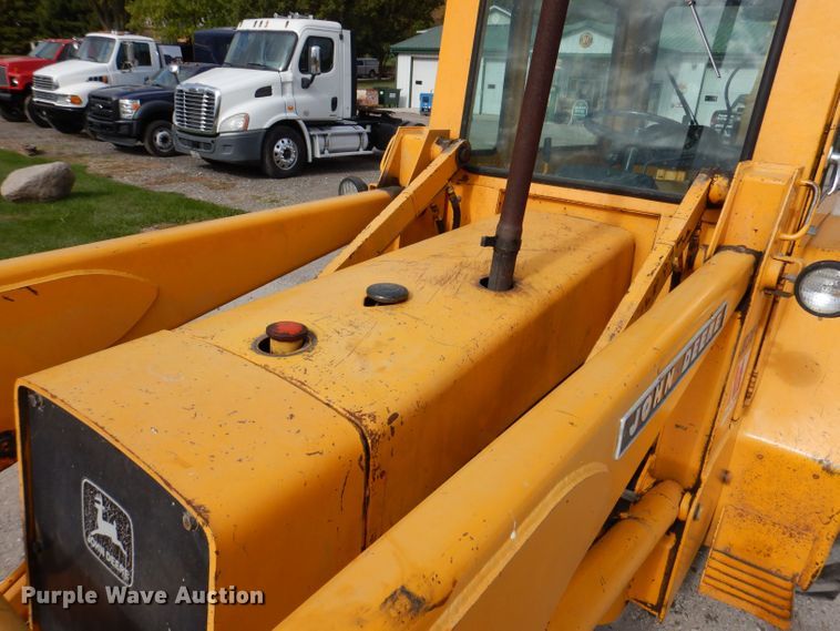 image for item KW9421 John Deere 310-A  backhoe