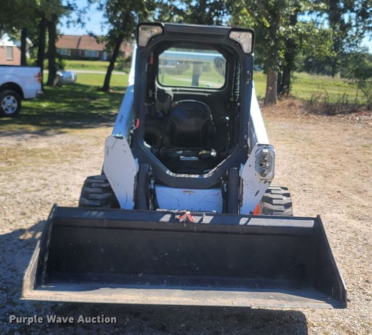 image for item LM9750 2015 Bobcat S590  skid steer loader