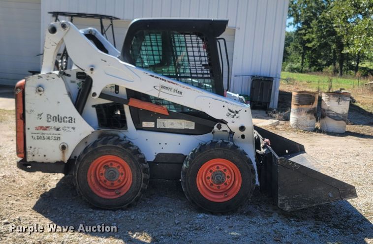 image for item LM9750 2015 Bobcat S590  skid steer loader