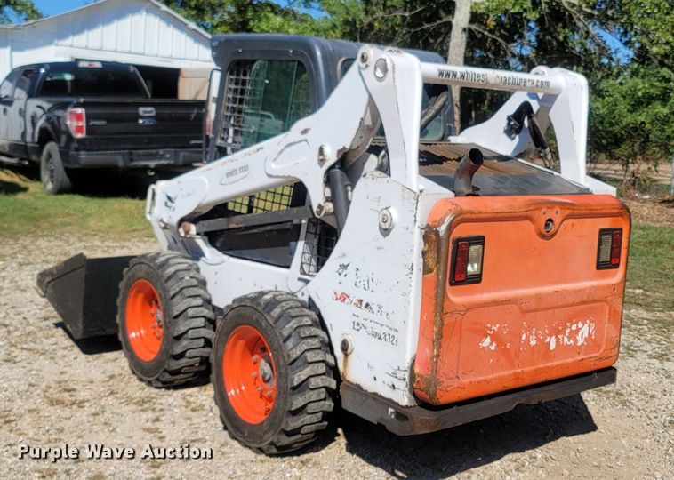 image for item LM9750 2015 Bobcat S590  skid steer loader