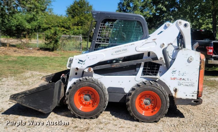 image for item LM9750 2015 Bobcat S590  skid steer loader