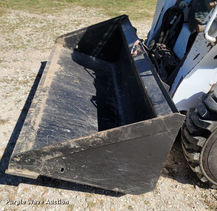 image for item LM9750 2015 Bobcat S590  skid steer loader