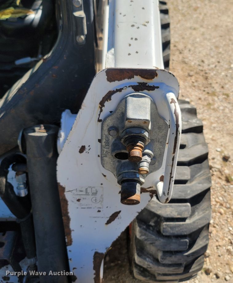 image for item LM9750 2015 Bobcat S590  skid steer loader