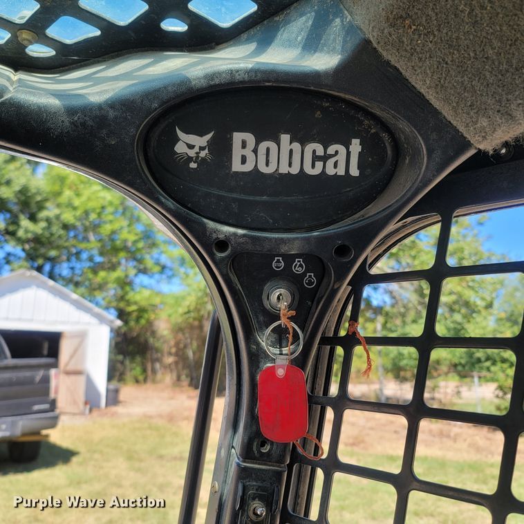 image for item LM9750 2015 Bobcat S590  skid steer loader