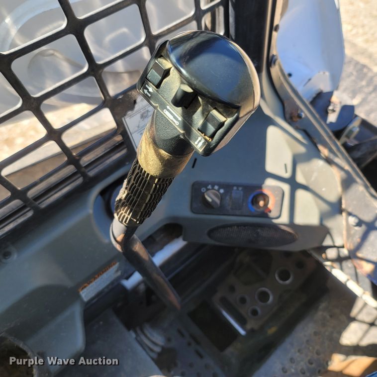 image for item LM9750 2015 Bobcat S590  skid steer loader