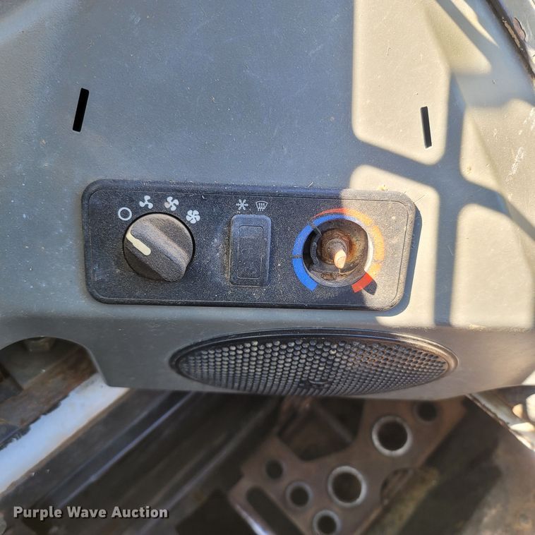 image for item LM9750 2015 Bobcat S590  skid steer loader