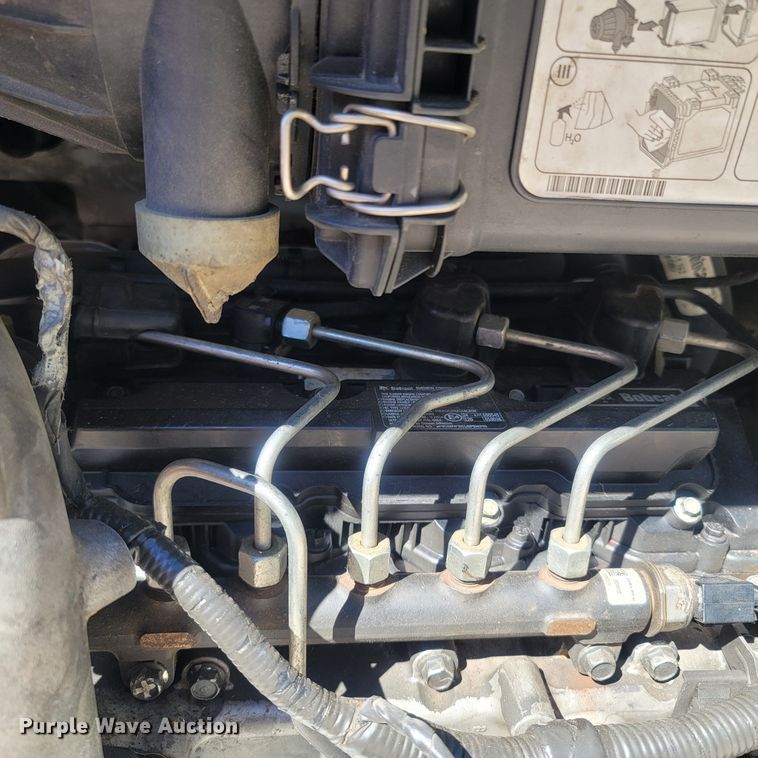 image for item LM9750 2015 Bobcat S590  skid steer loader