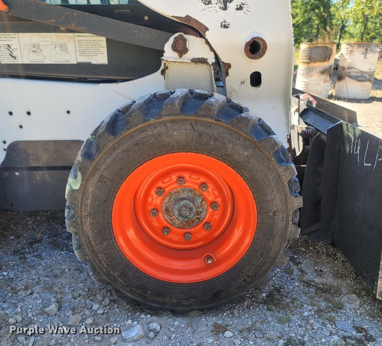 image for item LM9750 2015 Bobcat S590  skid steer loader