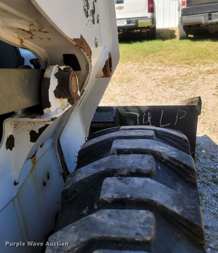 image for item LM9750 2015 Bobcat S590  skid steer loader