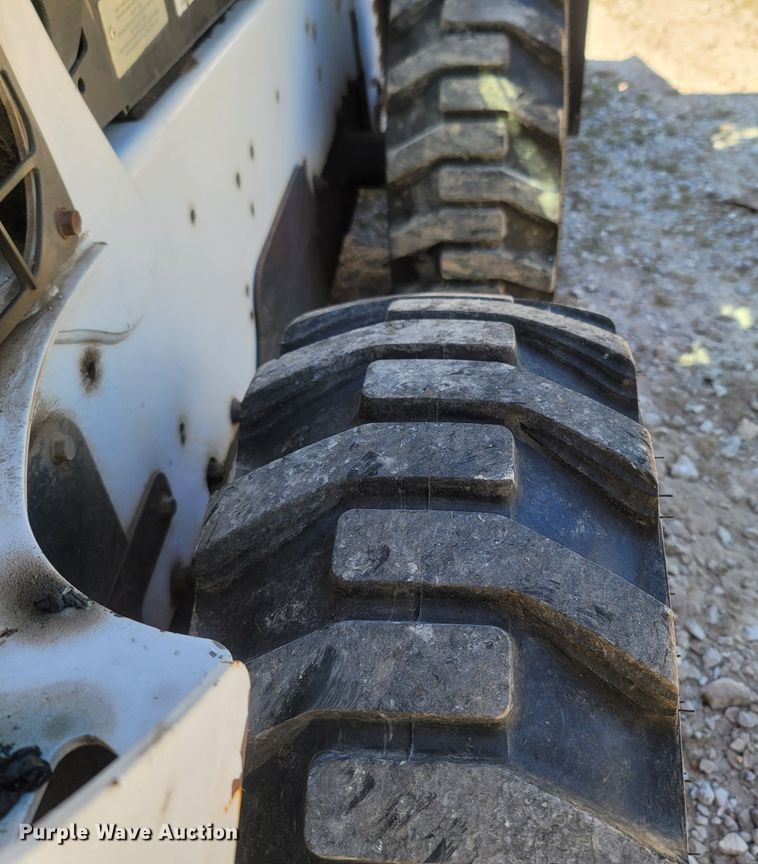 image for item LM9750 2015 Bobcat S590  skid steer loader