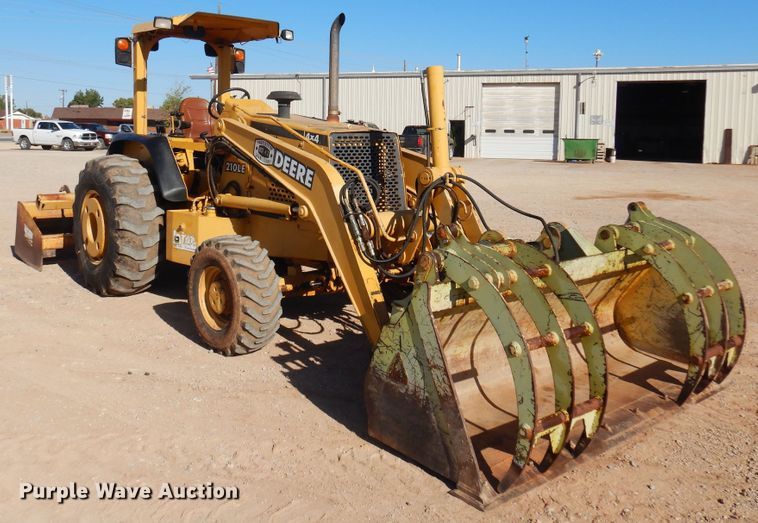 image for item KO9815 2001 John Deere 210LE  landscape tractor