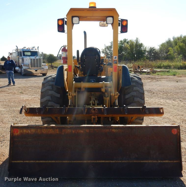 image for item KO9815 2001 John Deere 210LE  landscape tractor