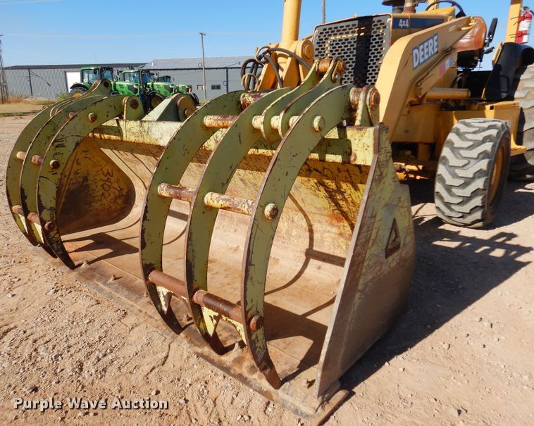 image for item KO9815 2001 John Deere 210LE  landscape tractor