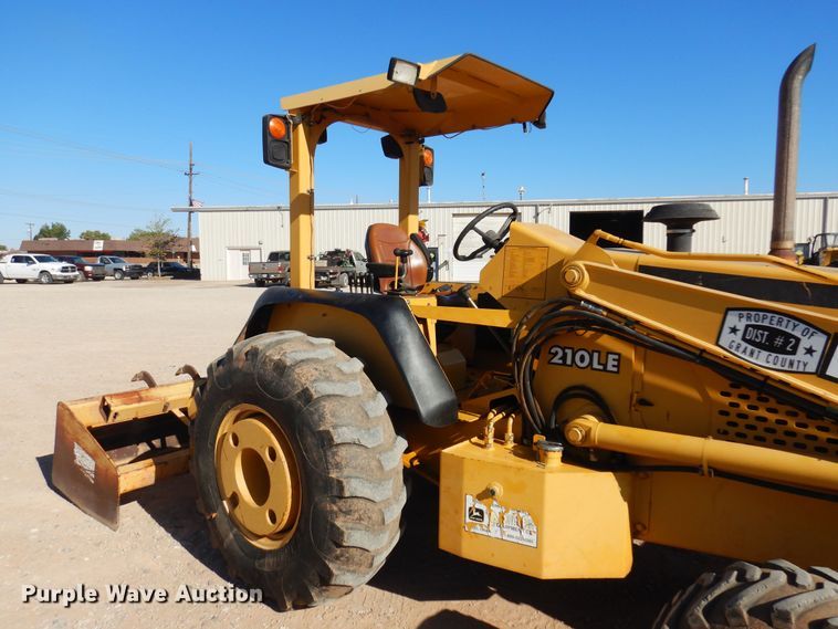 image for item KO9815 2001 John Deere 210LE  landscape tractor
