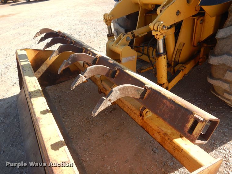 image for item KO9815 2001 John Deere 210LE  landscape tractor