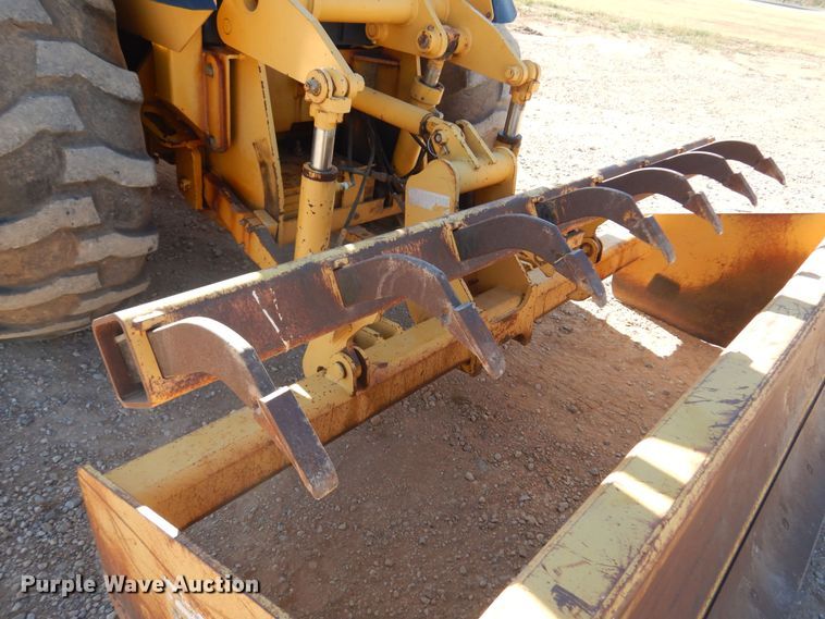 image for item KO9815 2001 John Deere 210LE  landscape tractor