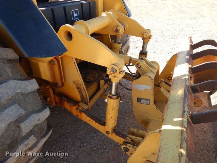 image for item KO9815 2001 John Deere 210LE  landscape tractor