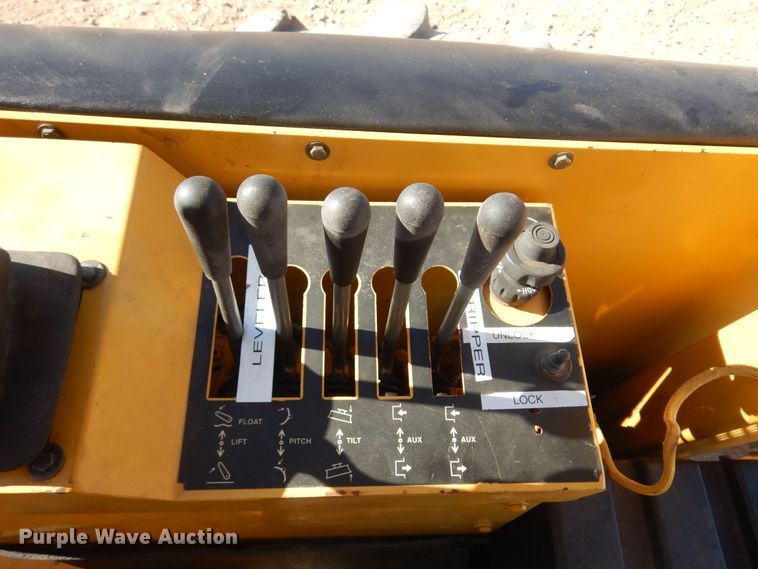 image for item KO9815 2001 John Deere 210LE  landscape tractor