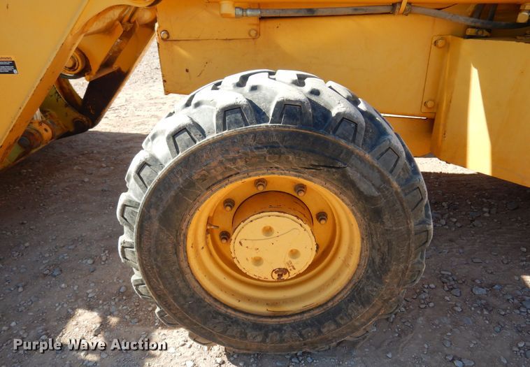 image for item KO9815 2001 John Deere 210LE  landscape tractor