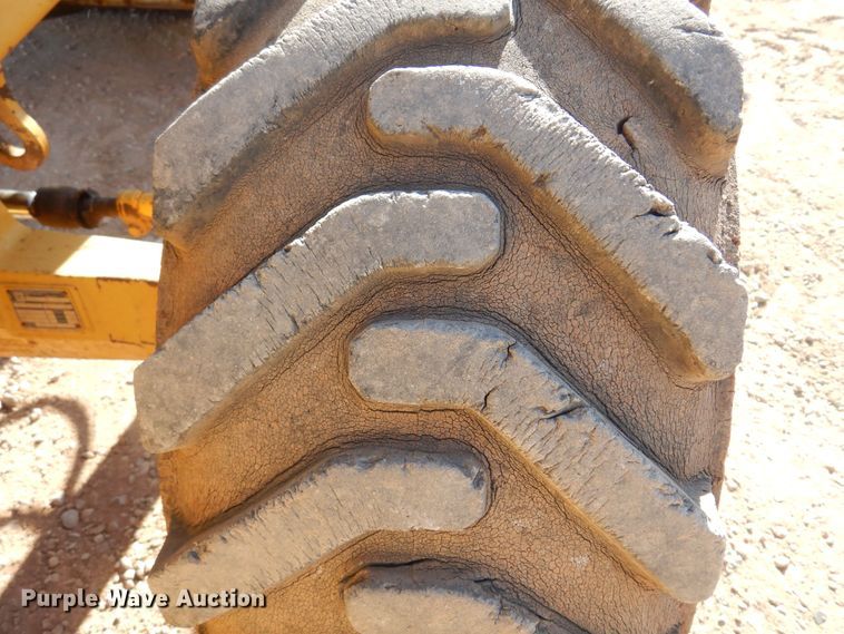 image for item KO9815 2001 John Deere 210LE  landscape tractor