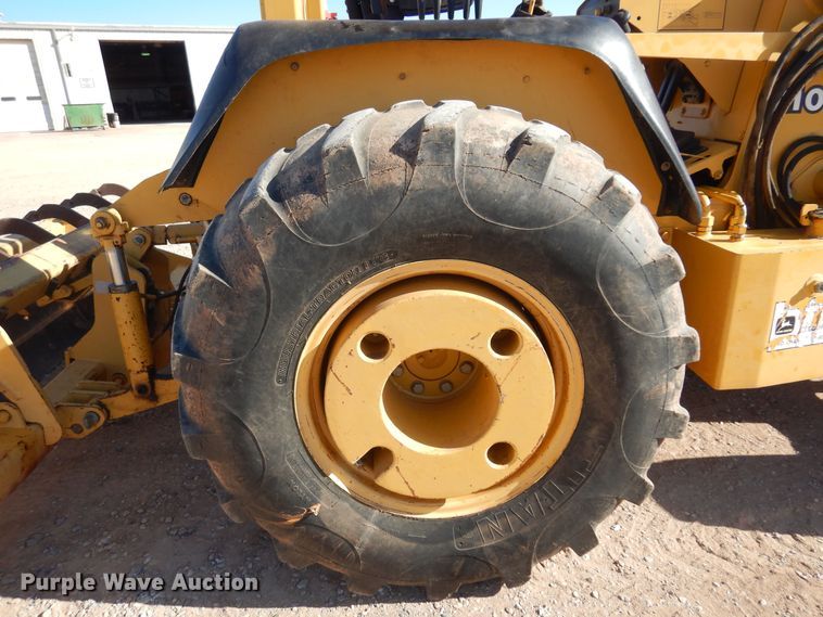 image for item KO9815 2001 John Deere 210LE  landscape tractor