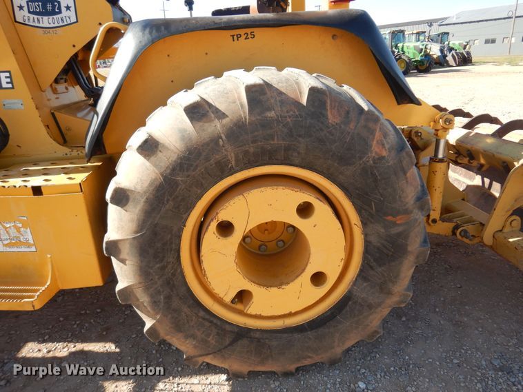 image for item KO9815 2001 John Deere 210LE  landscape tractor