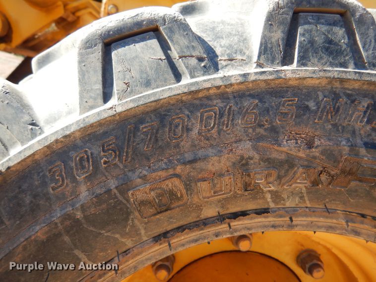 image for item KO9815 2001 John Deere 210LE  landscape tractor