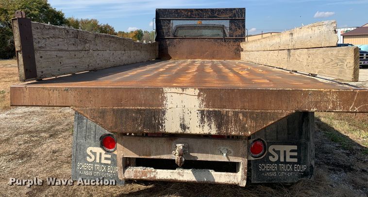 image for item MH9837 1996 GMC TopKick C6500  dump flatbed truck