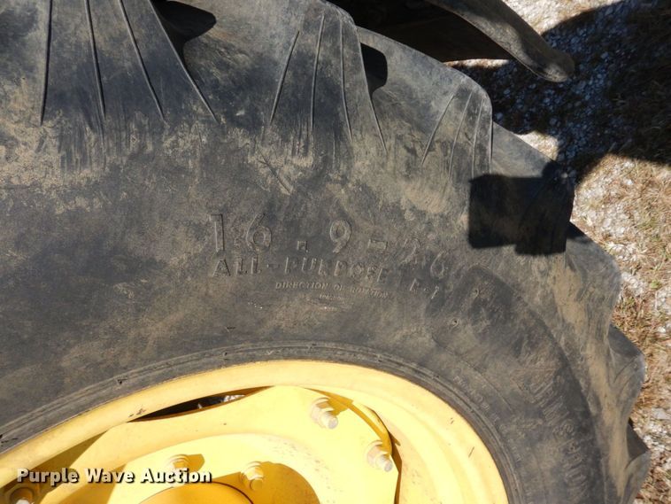 image for item DS1448 2001 John Deere 7210  MFWD tractor