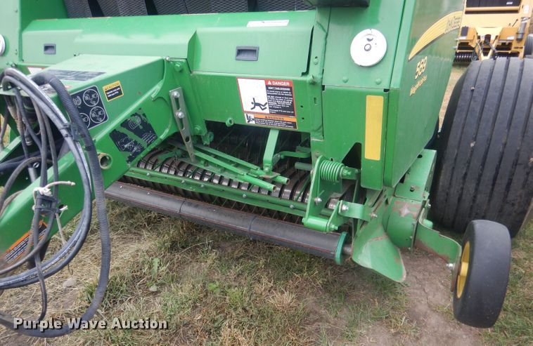 image for item HU9456 2013 John Deere 569  round baler