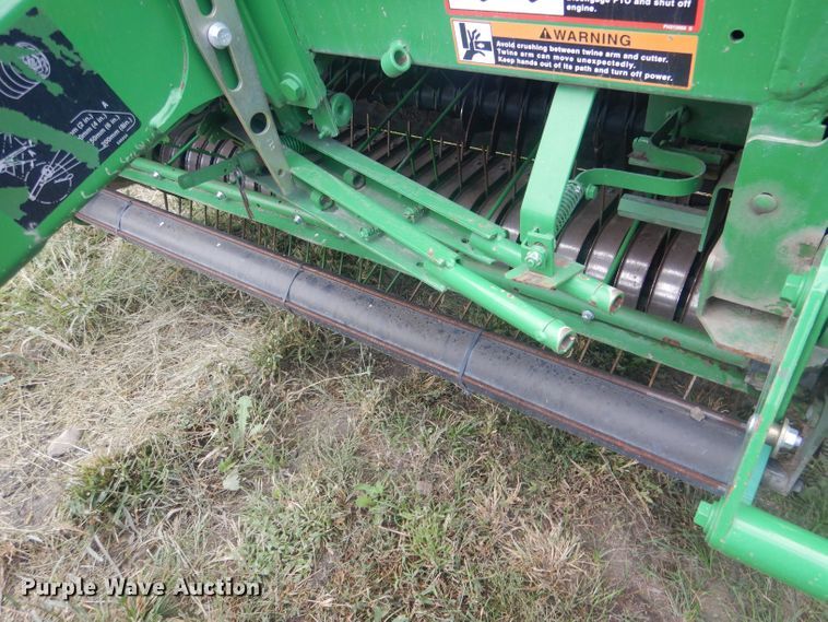 image for item HU9456 2013 John Deere 569  round baler