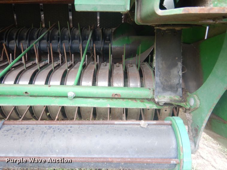 image for item HU9456 2013 John Deere 569  round baler