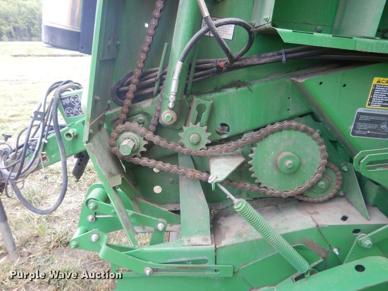 image for item HU9456 2013 John Deere 569  round baler