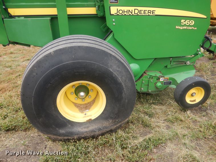 image for item HU9456 2013 John Deere 569  round baler