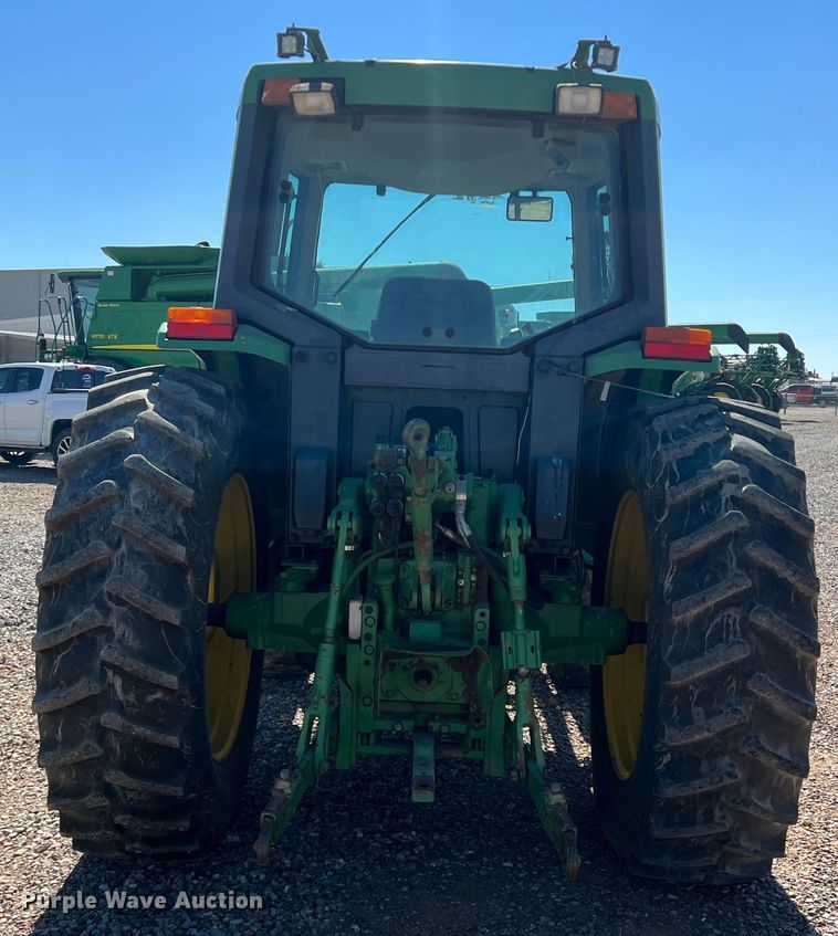 image for item MQ9839 1995 John Deere 6400  MFWD tractor