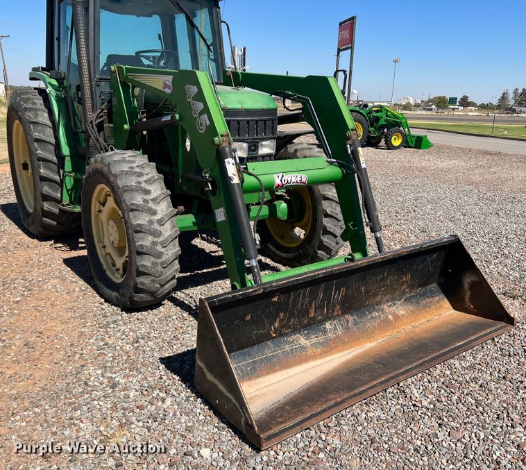 image for item MQ9839 1995 John Deere 6400  MFWD tractor