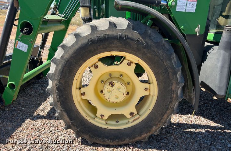 image for item MQ9839 1995 John Deere 6400  MFWD tractor