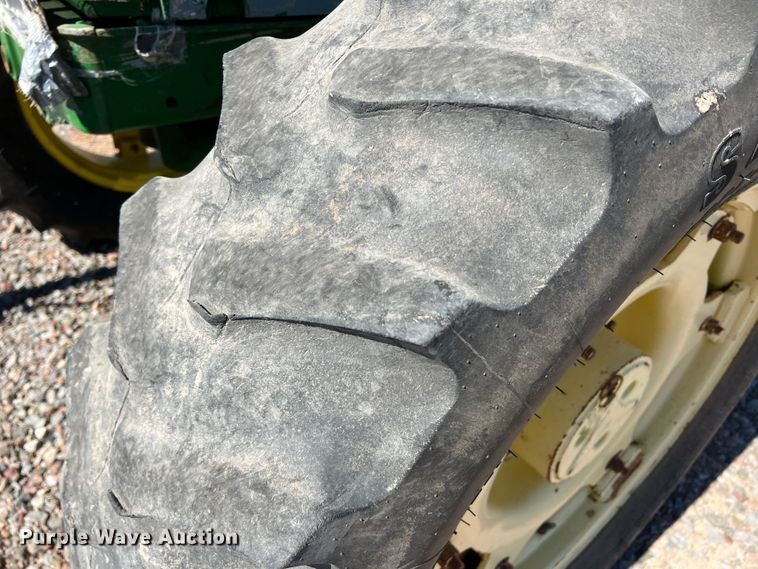 image for item MQ9839 1995 John Deere 6400  MFWD tractor