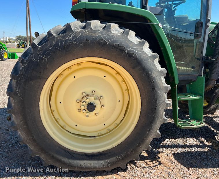 image for item MQ9839 1995 John Deere 6400  MFWD tractor